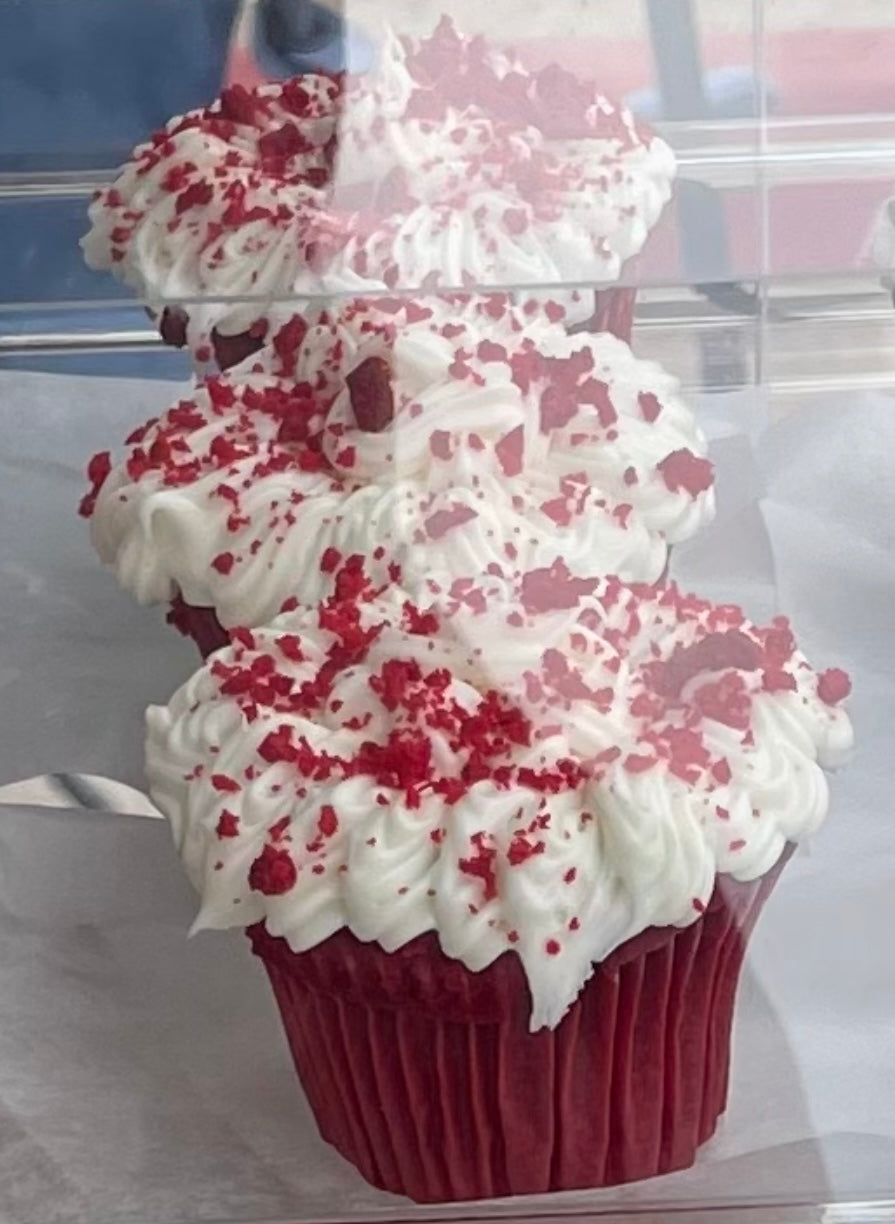 Red Velvet Cupcakes, made with our signature sweet cream cheese frosting