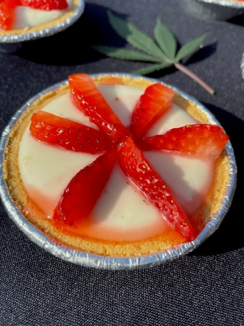 Mini Original Cheesecakes topped with fresh strawberries